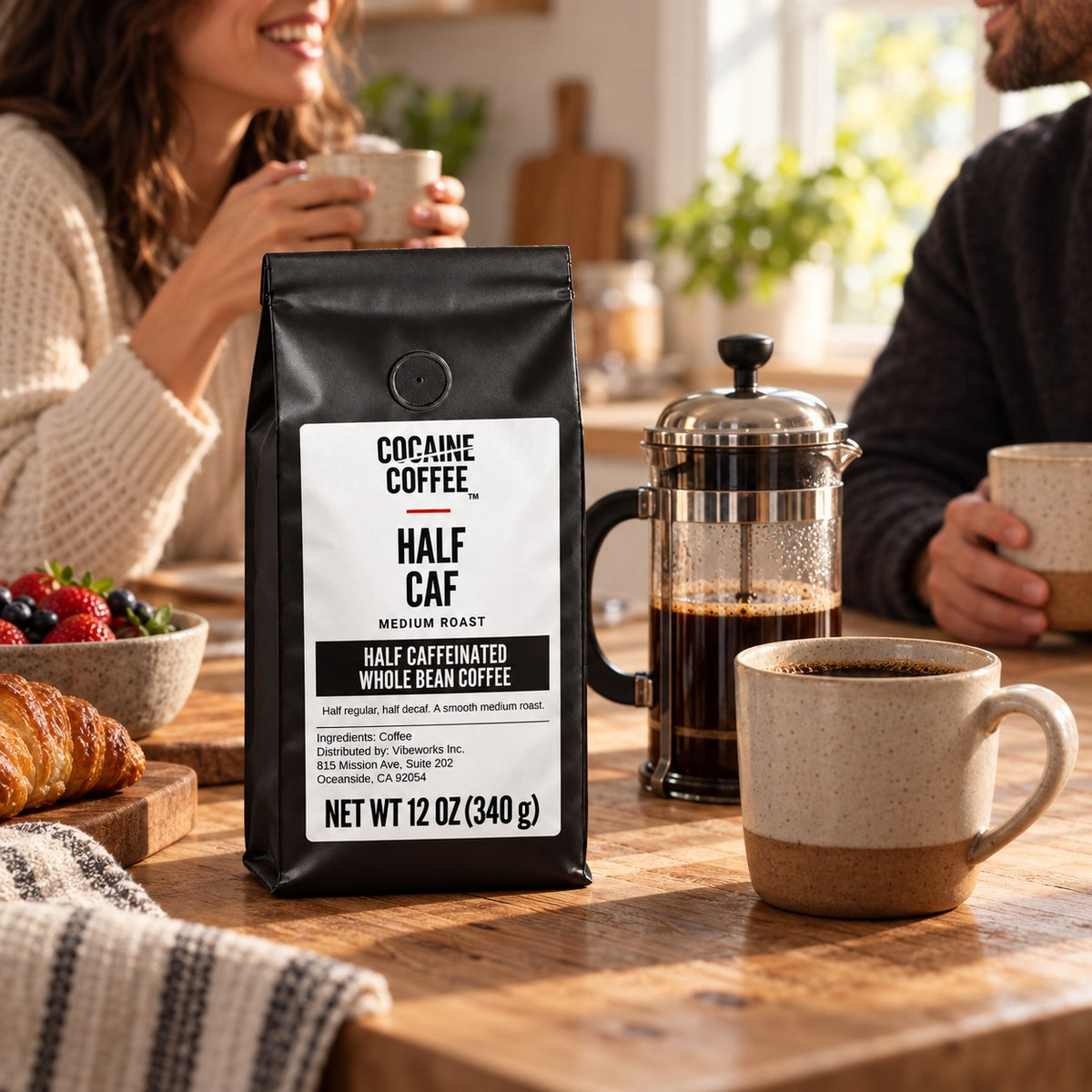 Half Caf coffee bag on the table with a cup of coffee
