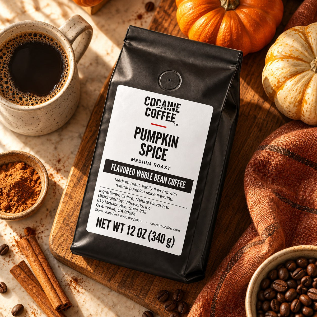 Pumpkin Spice coffee bag with beans and a cup, top view