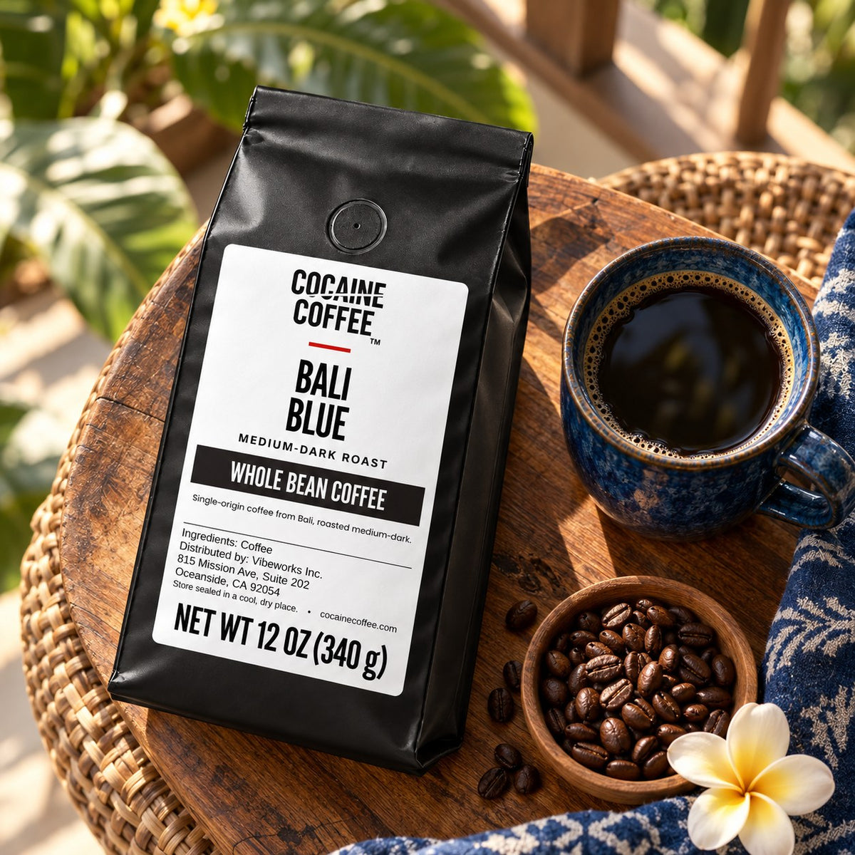 Bali Blue coffee bag with beans and a cup, top view