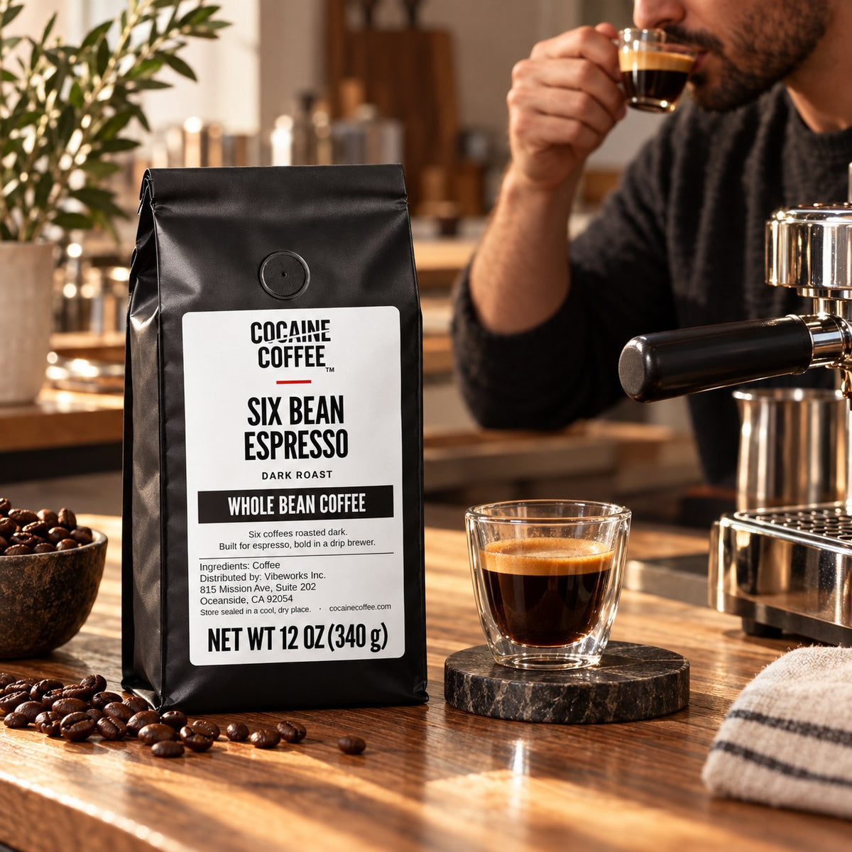 Six Bean Espresso coffee bag on the table with a cup of coffee